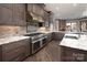 Well-equipped kitchen boasting stainless steel appliances and marble countertops at 3200 Beaty Rd, Gastonia, NC 28056