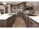 Elegant kitchen with stainless steel appliances, a marble countertop, and sleek, dark cabinetry at 3200 Beaty Rd, Gastonia, NC 28056