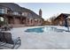 Backyard view featuring a swimming pool, patio, and outdoor entertaining spaces for summer relaxation at 3200 Beaty Rd, Gastonia, NC 28056