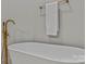 Luxury bathroom with a freestanding tub, elegant fixtures, and modern design at 3324 Flamingo Ave, Charlotte, NC 28205