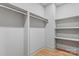 Spacious walk-in closet with ample shelving and storage, ideal for organizing wardrobes at 3324 Flamingo Ave, Charlotte, NC 28205