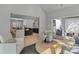 Bright and airy living room with hardwood floors, open floor plan, and access to outdoor seating area at 3324 Flamingo Ave, Charlotte, NC 28205