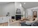 Cozy living room with a fireplace, and stylish decor, perfect for relaxation at 3324 Flamingo Ave, Charlotte, NC 28205