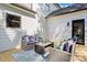 Inviting patio area with comfortable seating and lush greenery, creating a serene outdoor retreat at 3324 Flamingo Ave, Charlotte, NC 28205
