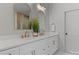 Elegant bathroom with double vanity, quartz countertop, stylish fixtures, and modern mirrors at 3328 Flamingo Ave, Charlotte, NC 28205