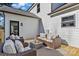 Cozy outdoor patio featuring comfortable seating, a modern outdoor rug, and a stylish design at 3328 Flamingo Ave, Charlotte, NC 28205