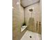 Modern tiled shower featuring a rainfall showerhead, built-in bench, and sleek design at 3328 Flamingo Ave, Charlotte, NC 28205