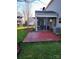 Spacious backyard features brick patio and mature landscaping for outdoor enjoyment at 3500 Exbury Gardens Dr, Waxhaw, NC 28173