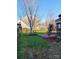 Lush backyard features well-maintained lawn, brick patio, and privacy fence at 3500 Exbury Gardens Dr, Waxhaw, NC 28173