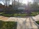Beautiful Prescott community entrance with stone wall and landscaping at 3500 Exbury Gardens Dr, Waxhaw, NC 28173