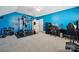 Game room with blue walls, carpeted floors, and gym at 369 Shoreline Pkwy, Tega Cay, SC 29708