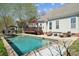 Backyard pool and patio area perfect for outdoor entertaining and relaxation at 369 Shoreline Pkwy, Tega Cay, SC 29708