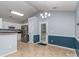 Charming dining area featuring ample natural light and modern chandelier at 4677 Arthur Way, Rock Hill, SC 29732