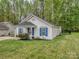 Well-maintained home featuring a lush lawn and a quaint, inviting front porch at 4677 Arthur Way, Rock Hill, SC 29732
