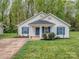 Charming single-Gathering home with well-manicured lawn and blue shutters, beautiful curb appeal at 4677 Arthur Way, Rock Hill, SC 29732