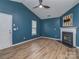 Spacious living room with fireplace, ceiling fan and abundant natural light at 4677 Arthur Way, Rock Hill, SC 29732