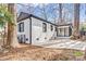 Brick home featuring a patio and fenced yard at 5009 Milford Rd, Charlotte, NC 28210