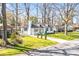 Charming home featuring mature landscaping and long driveway at 5009 Milford Rd, Charlotte, NC 28210