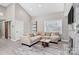 Bright living room with vaulted ceilings, marble fireplace, and cozy seating area at 5009 Milford Rd, Charlotte, NC 28210