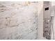 Contemporary shower with marble surround, shower head, and modern controls at 5009 Milford Rd, Charlotte, NC 28210