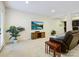 Finished basement area with leather sofa and television at 5059 Saint Clair St, Fort Mill, SC 29715