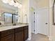 Bathroom with granite vanity, single sink, large mirror and glass-enclosed shower at 5059 Saint Clair St, Fort Mill, SC 29715