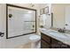 Clean bathroom featuring a shower-tub combo, granite vanity, and dark hardware at 5059 Saint Clair St, Fort Mill, SC 29715