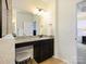 Bathroom with granite vanity, makeup counter, and stool at 5059 Saint Clair St, Fort Mill, SC 29715