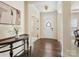 Inviting foyer with hardwood floors, a decorative table, and views into other rooms at 5059 Saint Clair St, Fort Mill, SC 29715