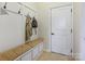 Cozy mudroom with bench seating and coat rack at 5059 Saint Clair St, Fort Mill, SC 29715