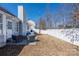 Large backyard with a patio and a white fence, perfect for outdoor activities at 5616 Ebley Ln, Charlotte, NC 28227