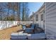 Private backyard featuring a seating area, small playhouse, and access to the house at 5616 Ebley Ln, Charlotte, NC 28227