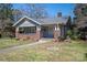 Charming single Gathering home with a brick foundation, covered porch and inviting curb appeal at 634 Carolina Ave, Gastonia, NC 28052