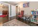 Cozy living room showcases hardwood floors, an area rug, stylish decor, and seamlessly connects to other rooms at 707 Oakshade Ave, Kannapolis, NC 28083