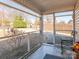 Inviting screened porch offering a relaxing outdoor space with views of the surrounding neighborhood at 707 Oakshade Ave, Kannapolis, NC 28083