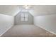 Spacious bedroom featuring a large window providing ample natural light at 7815 Ambleside Dr, Charlotte, NC 28216