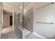 Beautiful bathroom features a large shower with stone flooring and a frameless glass partition at 10101 Woodview Cir, Charlotte, NC 28277