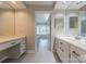 Luxurious bathroom featuring dual vanities and ample counter space, providing a spa-like experience at home at 10101 Woodview Cir, Charlotte, NC 28277