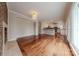 Elegant dining space with hardwood floors and seamless flow into the modern kitchen at 10101 Woodview Cir, Charlotte, NC 28277