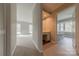 Hallway leading to a spacious bedroom and bathroom at 10101 Woodview Cir, Charlotte, NC 28277