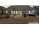Backyard featuring a brick patio, outdoor seating, a grill, and a well-maintained lawn at 11124 Chapeclane Rd, Charlotte, NC 28278