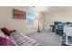 Functional bedroom with a comfortable daybed, neutral walls, and ample storage space at 11124 Chapeclane Rd, Charlotte, NC 28278