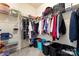 Spacious walk-in closet with ample storage shelving and hanging space for clothes and accessories at 11124 Chapeclane Rd, Charlotte, NC 28278