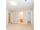 Comfortable carpeted bedroom with multiple doors leading to a bathroom and closets at 1212 Shenandoah Cir, Rock Hill, SC 29730