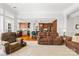 Spacious living room featuring hardwood floors and an open view of the kitchen at 12228 Plover Dr, Charlotte, NC 28269