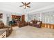 Spacious open floor plan with living room, dining area, and kitchen at 12228 Plover Dr, Charlotte, NC 28269