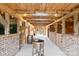 Unique barn interior featuring wood construction, brick accents, and rustic details at 1620 London Rd, Mooresville, NC 28115