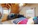 Cozy bedroom with wood-beamed ceilings, and comfortable bed at 1620 London Rd, Mooresville, NC 28115