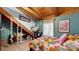 Bright bedroom with vaulted ceiling, playful decor, and cozy accents at 1620 London Rd, Mooresville, NC 28115