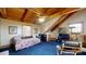 Cozy bedroom with wood-beamed ceilings and comfortable furnishings at 1620 London Rd, Mooresville, NC 28115